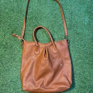 Brown faux leather tote bag with detachable shoulder strap.